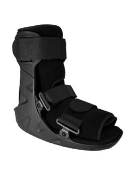 Black low walker boot with fastening straps and a rigid sole, model family FT36x.