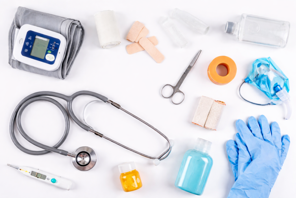 Medical supplies arranged on white background